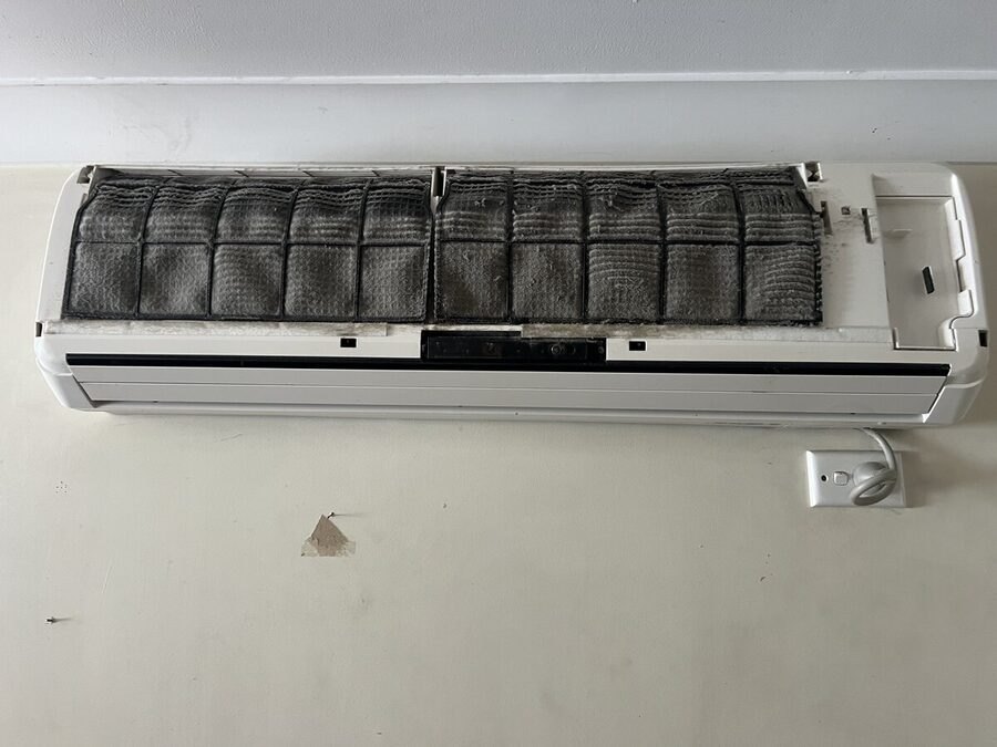 Split system with blackened filters before cleaning